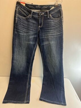 Wrangler jeans Dark Wash Bootcut Jeans with White Stitching.